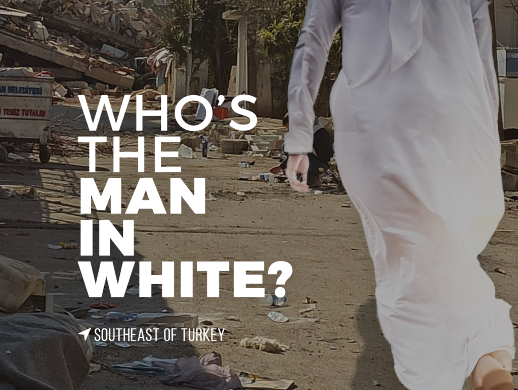 Who is the man in White?